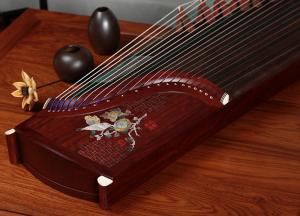 买古筝是楠木的好还是红木的好?