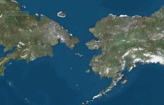白令海峡是俄罗斯与美国___ ,___.